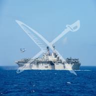 An MV-22B Osprey takes off from the USS America (LHA-6).