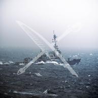 USS William P. Lawrence (DDG-110) sails in rough seas in the South China Sea.